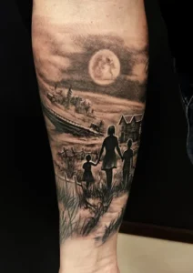 tatuaż na przedramieniu rodzina zachód słońca