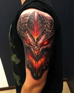 tatuaż na ramieniu diablo